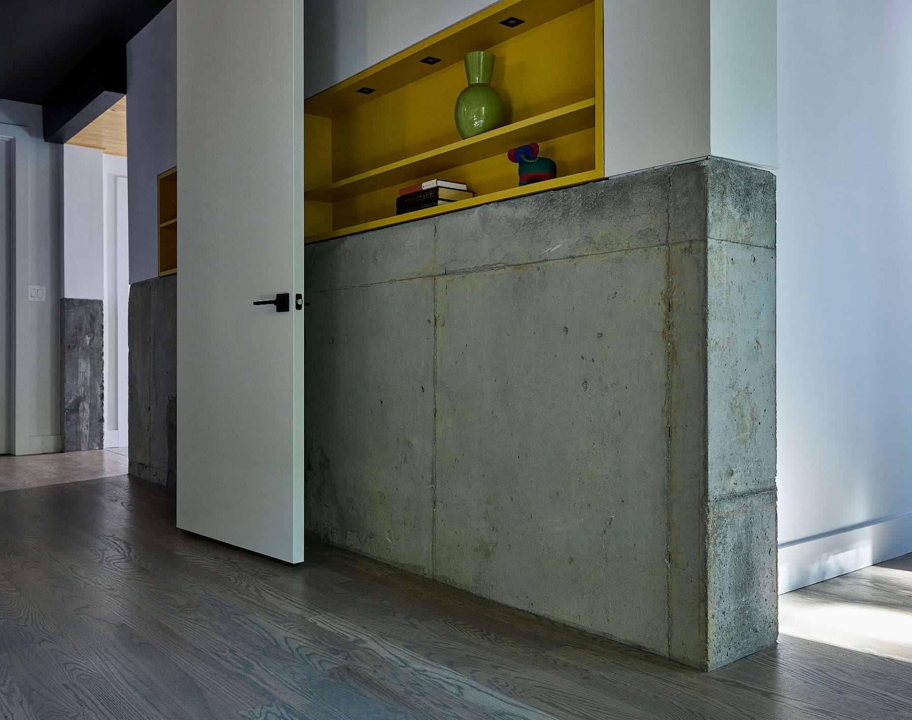 Wall showing exposed concrete.