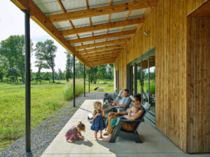 Family sitting on the covered patio.